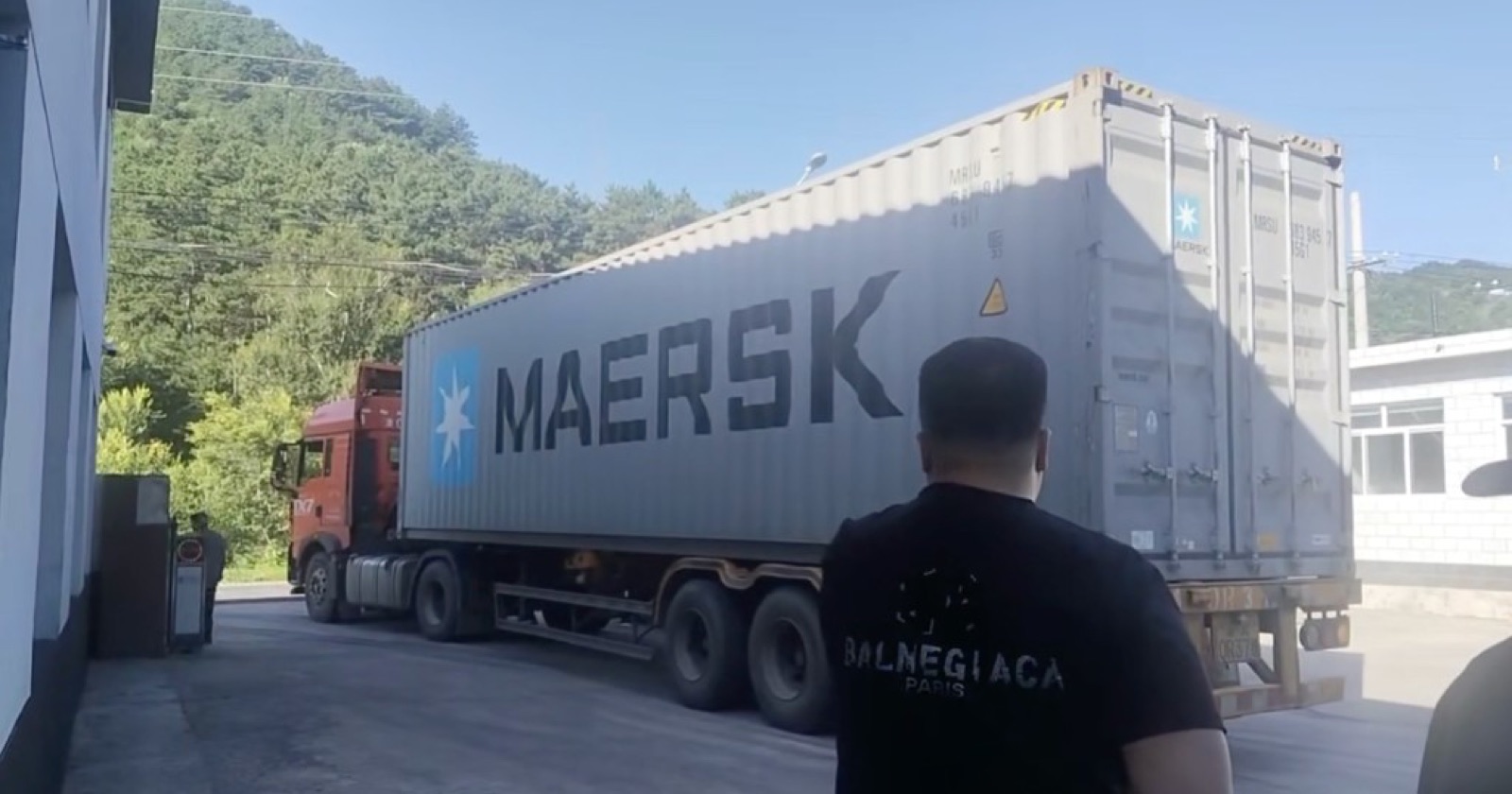 Container carrying imported coconut shell charcoal arriving at a factory in China